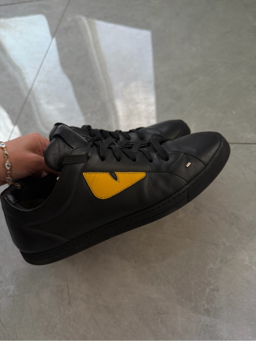 Fendi Black Leather Sneakers with Yellow Patch